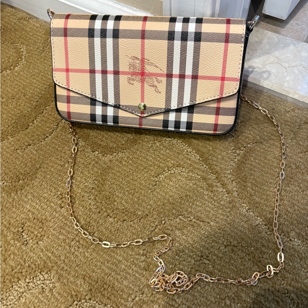 Unk Crossbody Bag